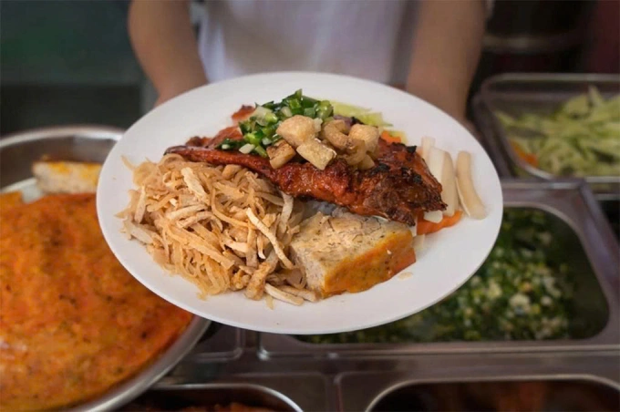 Cơm tấm sườn, bì, chả. Ảnh: Cao Kỳ Nhân